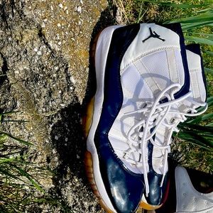 Black and white air Jordans, high tops